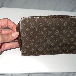 Louise Vuitton wallet used as a prop in a film… housed in wardrobe inventory